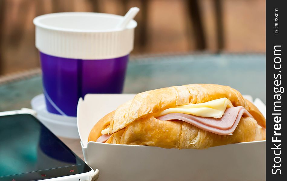 Ham cheese croissant placed on the table. Ham cheese croissant placed on the table.