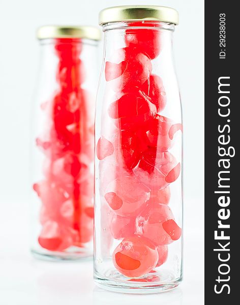 Glass of cherry compote on a white background. Glass of cherry compote on a white background