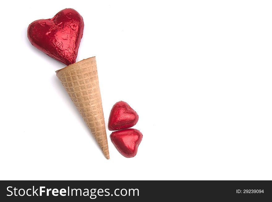 Red Heart in a ice cream cone with two small red hearts. Red Heart in a ice cream cone with two small red hearts