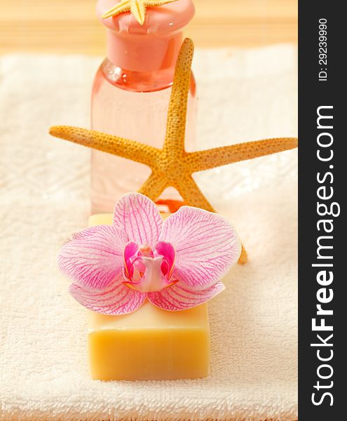 Bars of soap with orchid flower and towel. Bars of soap with orchid flower and towel
