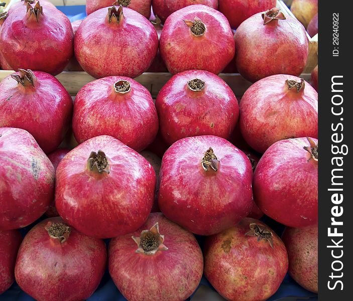 Close up of pomegranates on market stand