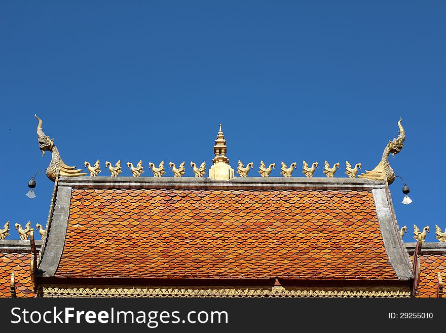 Roof of thai temple on blue background. Roof of thai temple on blue background