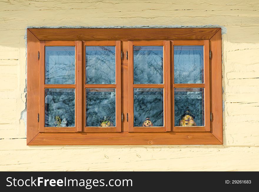 View in a traditional wooden cottage window in Vlkolinec - Slovakia