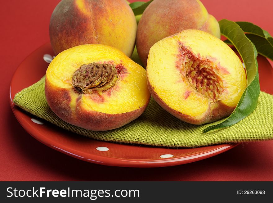 Plate of delicious fresh summer peaches fruit