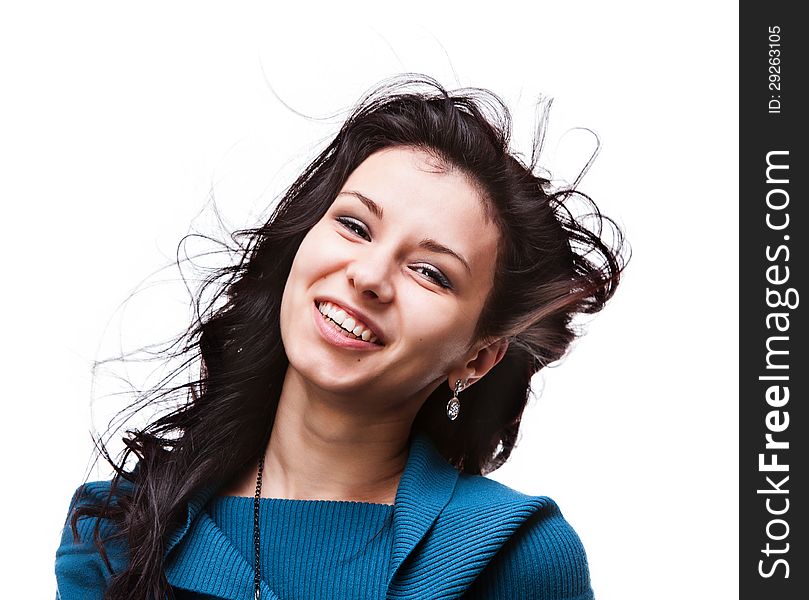 Portrait of a beautiful young woman with hair flying