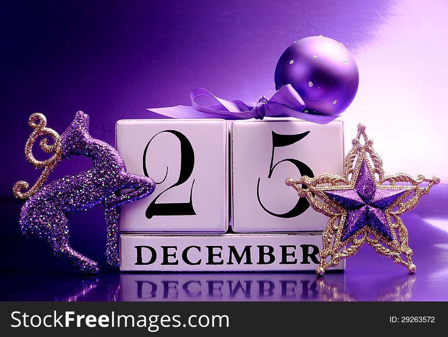 Purple theme Save the Date calendar for Christmas Day, December 25, with bauble and reindeer decorations. Purple theme Save the Date calendar for Christmas Day, December 25, with bauble and reindeer decorations.