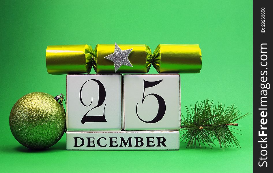 Green theme save the date white calendar for Christmas Day, December 25, with bauble, pine and christmas cracker bon bon. Green theme save the date white calendar for Christmas Day, December 25, with bauble, pine and christmas cracker bon bon.