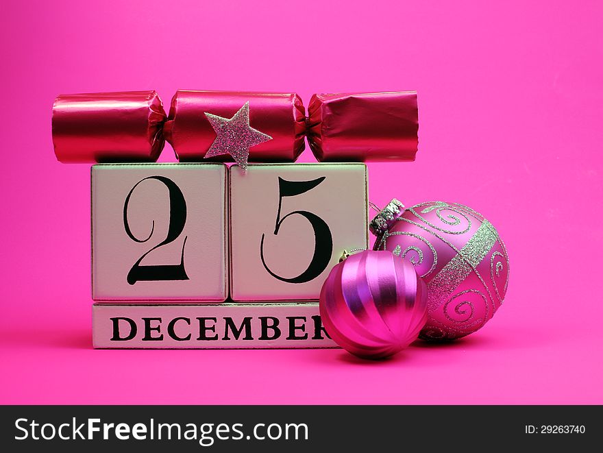 Pink theme save the date white calendar for Christmas Day, December 25, with festive bauble, pine and christmas cracker bon bon. Pink theme save the date white calendar for Christmas Day, December 25, with festive bauble, pine and christmas cracker bon bon.
