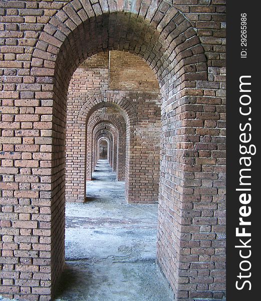 Within fort jefferson at the dry tortugas national park are these walkways full of arches. Within fort jefferson at the dry tortugas national park are these walkways full of arches.