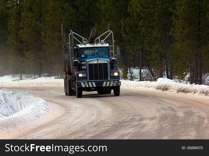 Empty Logging Truck Heading for more Logs