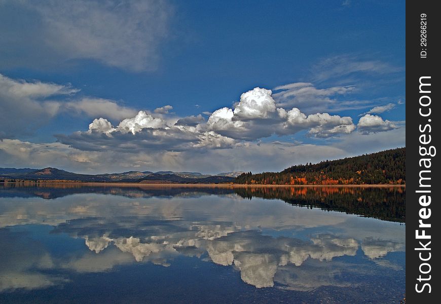 This image of the reflection on Teton Lake was taken near Grand Teton National Park in Wyoming. This image of the reflection on Teton Lake was taken near Grand Teton National Park in Wyoming.