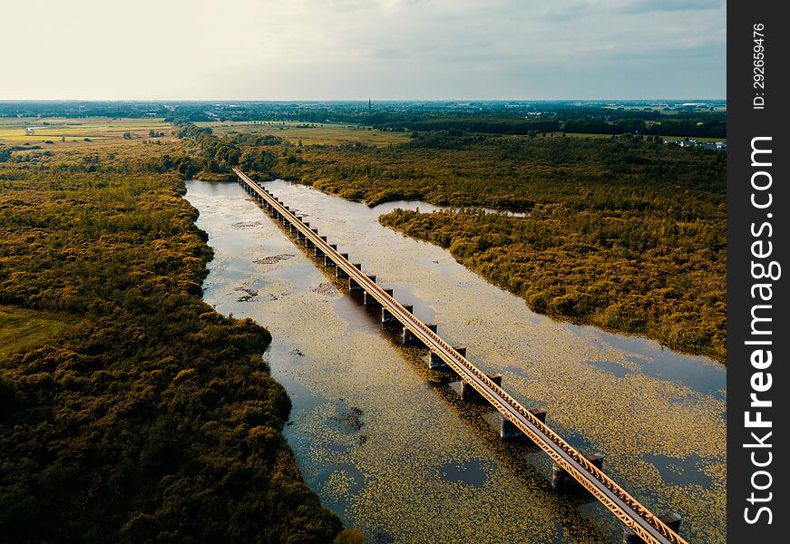 Aerial drone view of the historical unfinished railway bridge of Moerputtenbrug in Noord Brabant, the Netherlands.