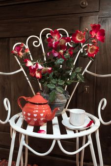 Still Life With Antique Chair, Flowers And Tea Stock Images Still Life With Antique Chair, Flowers And Tea Stock Images