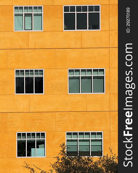 Orange Building With Stark Contrasting Windows