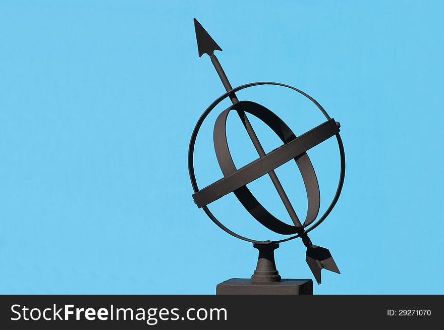 Armillary Sphere on sky blue background