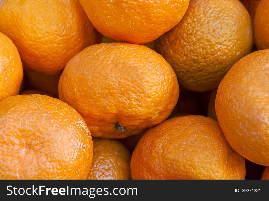 Bunch of fresh mandarin oranges on market