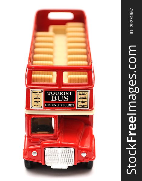 Red double decker toy tourist bus. Red double decker toy tourist bus
