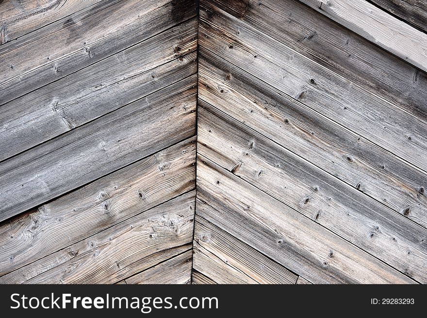 Symmetrical old wooden wall background. Symmetrical old wooden wall background