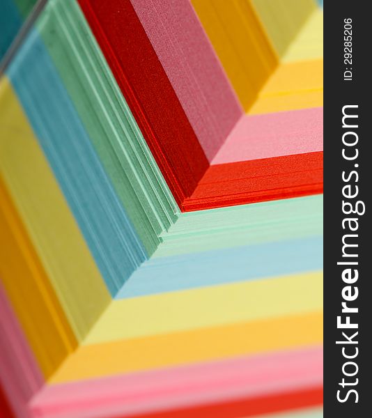 Closeup view of a block of colorful sticky notes. Closeup view of a block of colorful sticky notes.