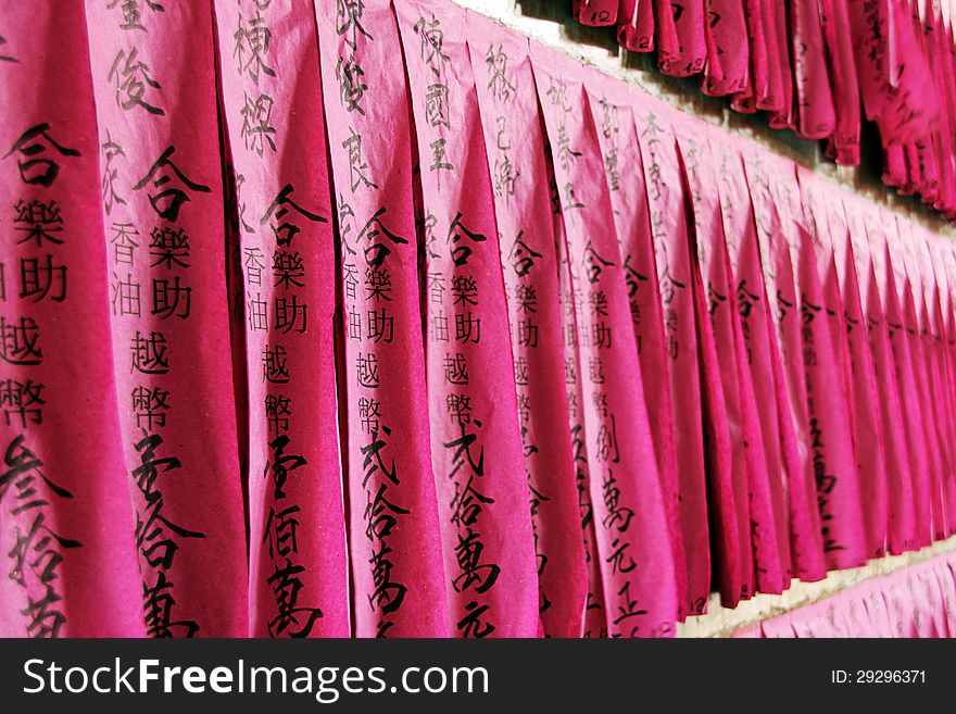 Prayers in a chinese buddhist temple. Prayers in a chinese buddhist temple