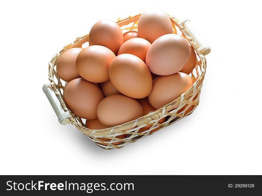 Eggs in basket, isolate on white