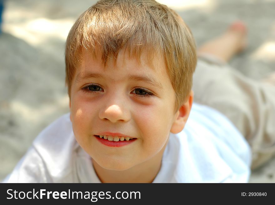 Handsome boy at outdoors playground