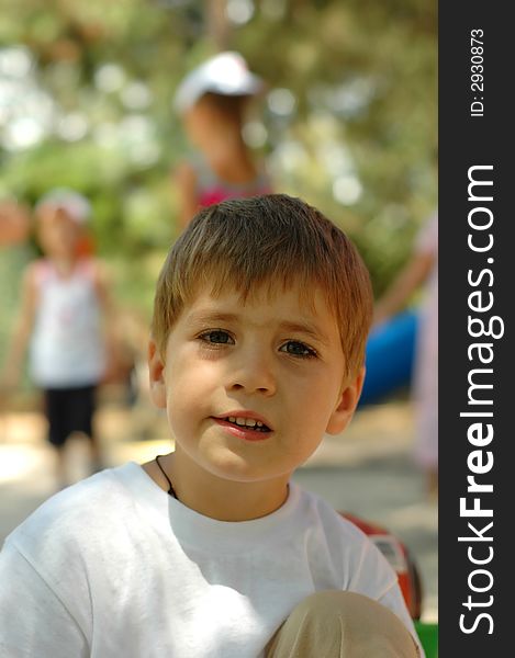 Handsome boy at outdoors playground