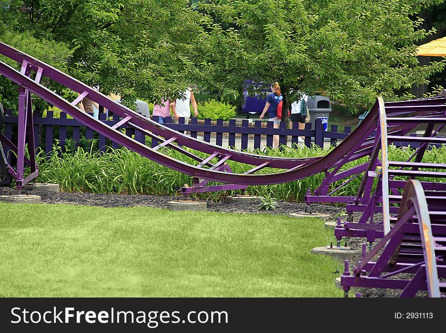 Purple Children's Roller Coaster at an Amusement Park