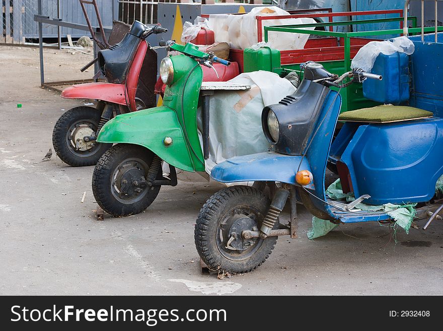 Three Transport Scooters