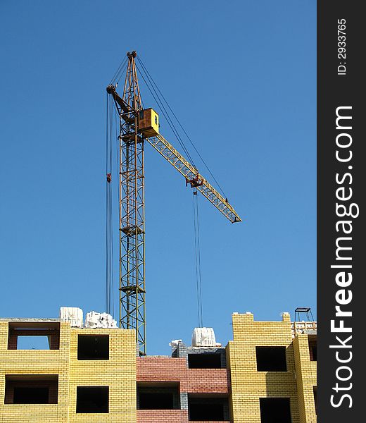 Building crane on construction vein high-rise building