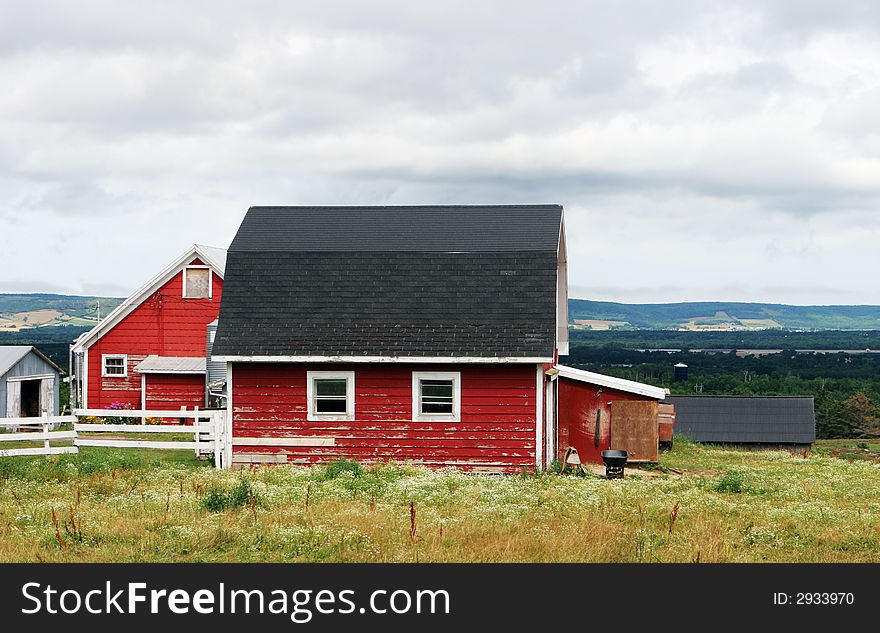 Red barn and farm buildings - countryside scenic.