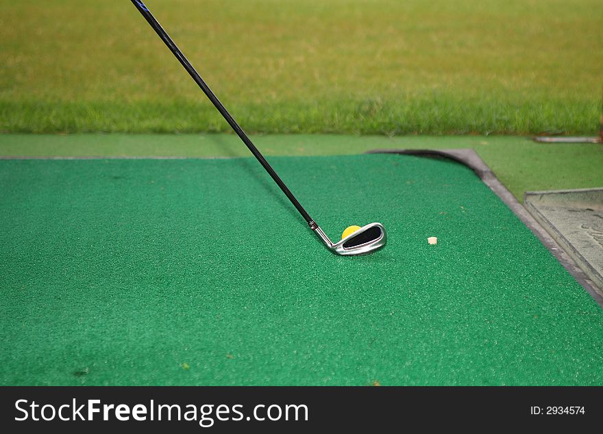 Senior golfer play golf in the city golf school field. Senior golfer play golf in the city golf school field