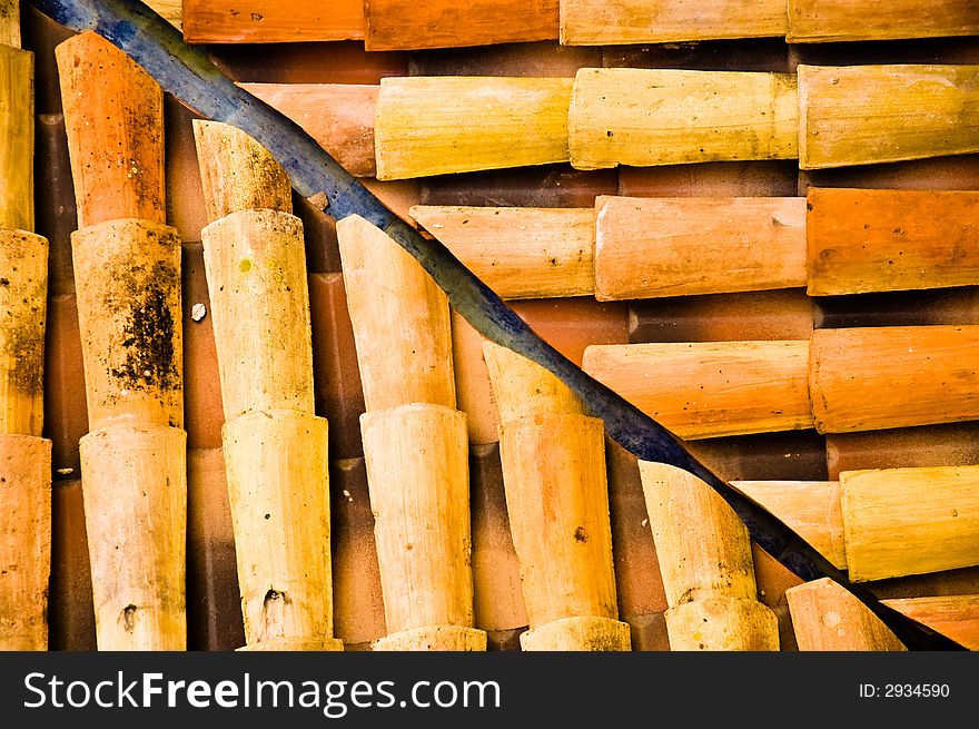 Symmetrical pattern in terracotta roofing tiles. Symmetrical pattern in terracotta roofing tiles