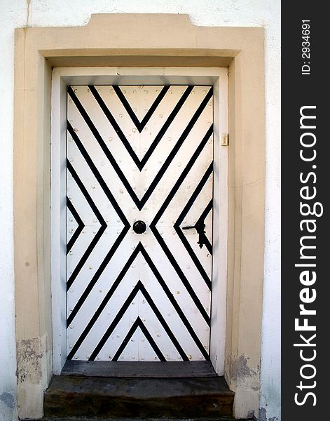 Old stylish door on the castle Bouzov in Czech