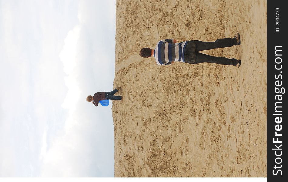 Family with children on dunes
