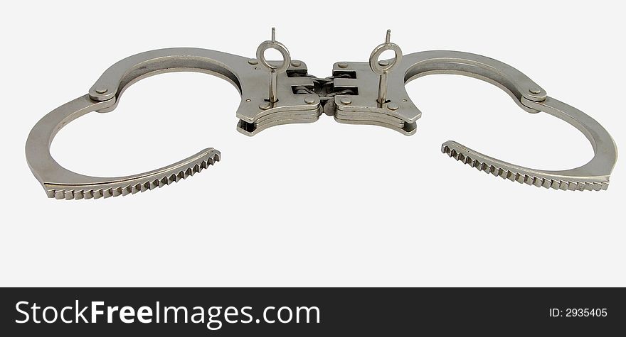 Open handcuffs the law showing its teeth