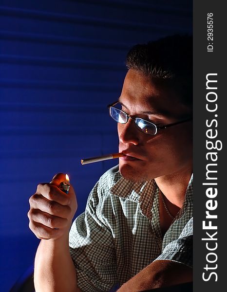 Photo of a cigarette smoking.