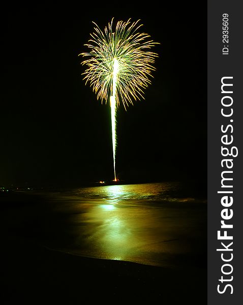 Photo of a fireworks at the beach.