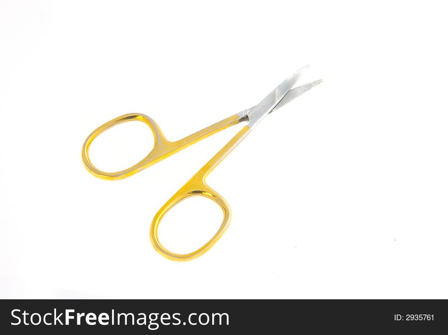 Photo of the scissors isolated on a white background