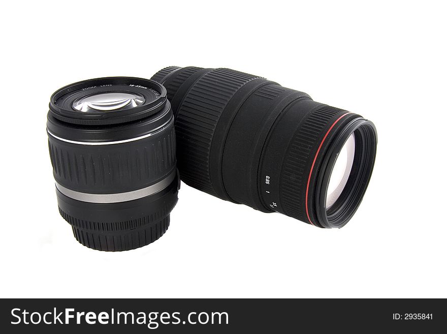 Photo of a zoom and telephoto photography lenses on white background