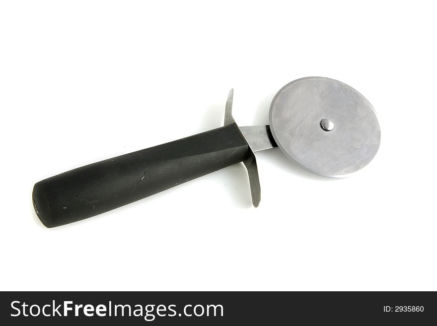 Photo of a pizza cutter on a white background