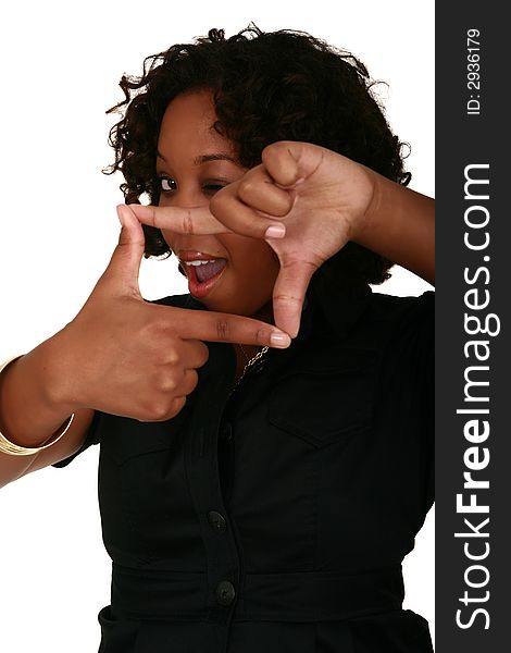 Isolated african american girl posing with her hand in front shaped square showing happy and fun expression