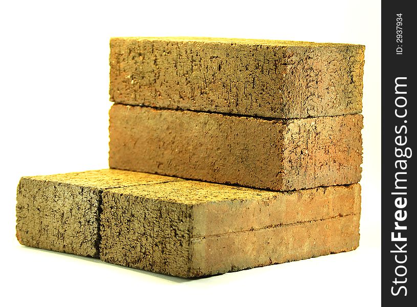 Plain house bricks isolated on a white background