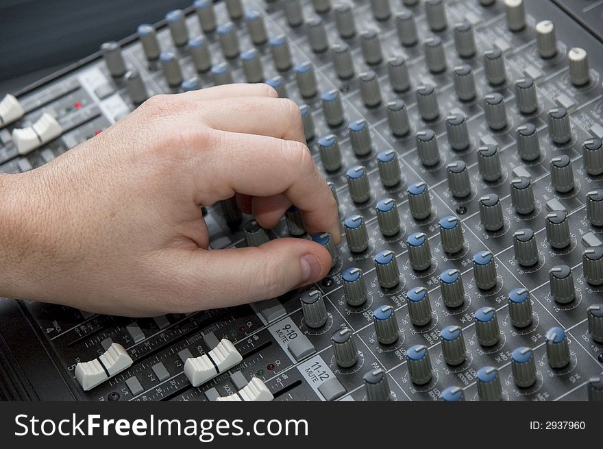 Closeup view of a DJ's mixing desk with shallow depth of field. Closeup view of a DJ's mixing desk with shallow depth of field