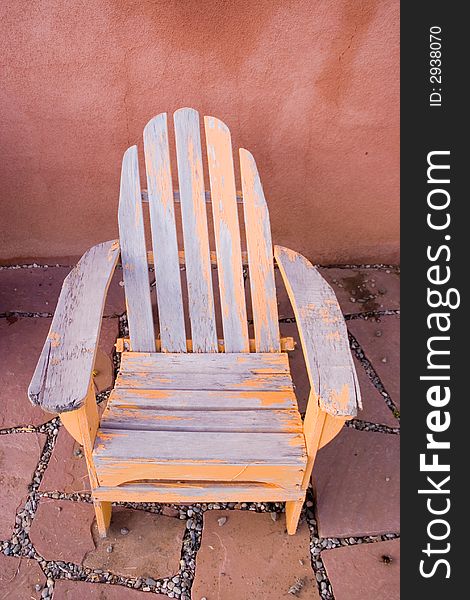 Old rustic chair with peeling yellow paint. Old rustic chair with peeling yellow paint