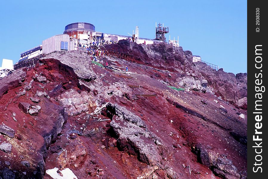 View of the human and natural damage of rim of Mount Fuji's crater. View of the human and natural damage of rim of Mount Fuji's crater