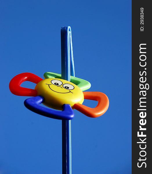 Beautiful colours toys image on the blue sky background