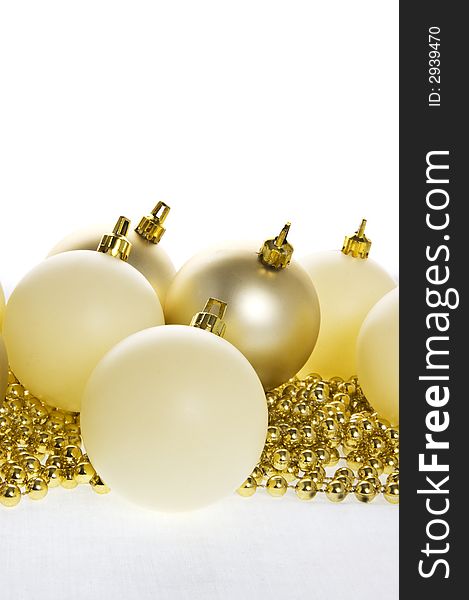 Complimentary golden & cream coloured christmas decorations. Complimentary golden & cream coloured christmas decorations