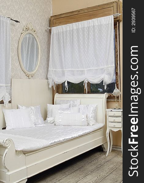 Antique-like stressed wood white bed