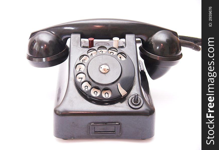 Black vintage phone isolated over white background